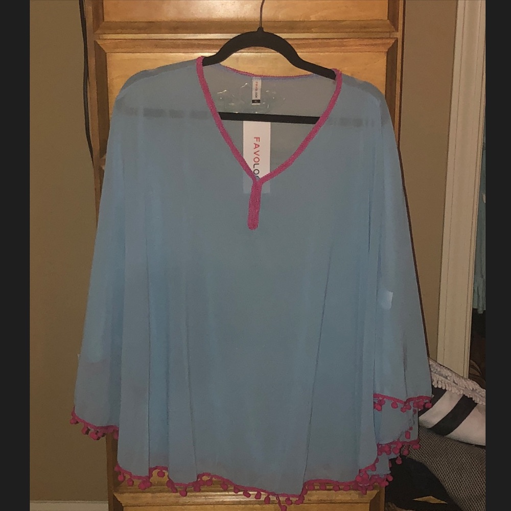 Blue cover up with Pom’s